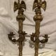 Pair of candle holders in wall, eagle pattern in gilded wood and brass