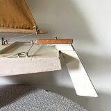 Navigable wooden sailing ship with pretty vintage colors