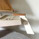 Navigable wooden sailing ship with pretty vintage colors