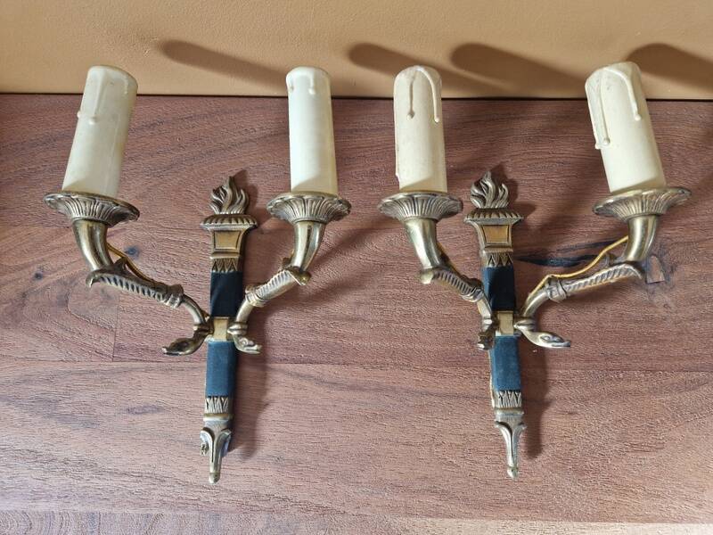 Pair of Empire-style wall sconces in gilded bronze and green lacquer.