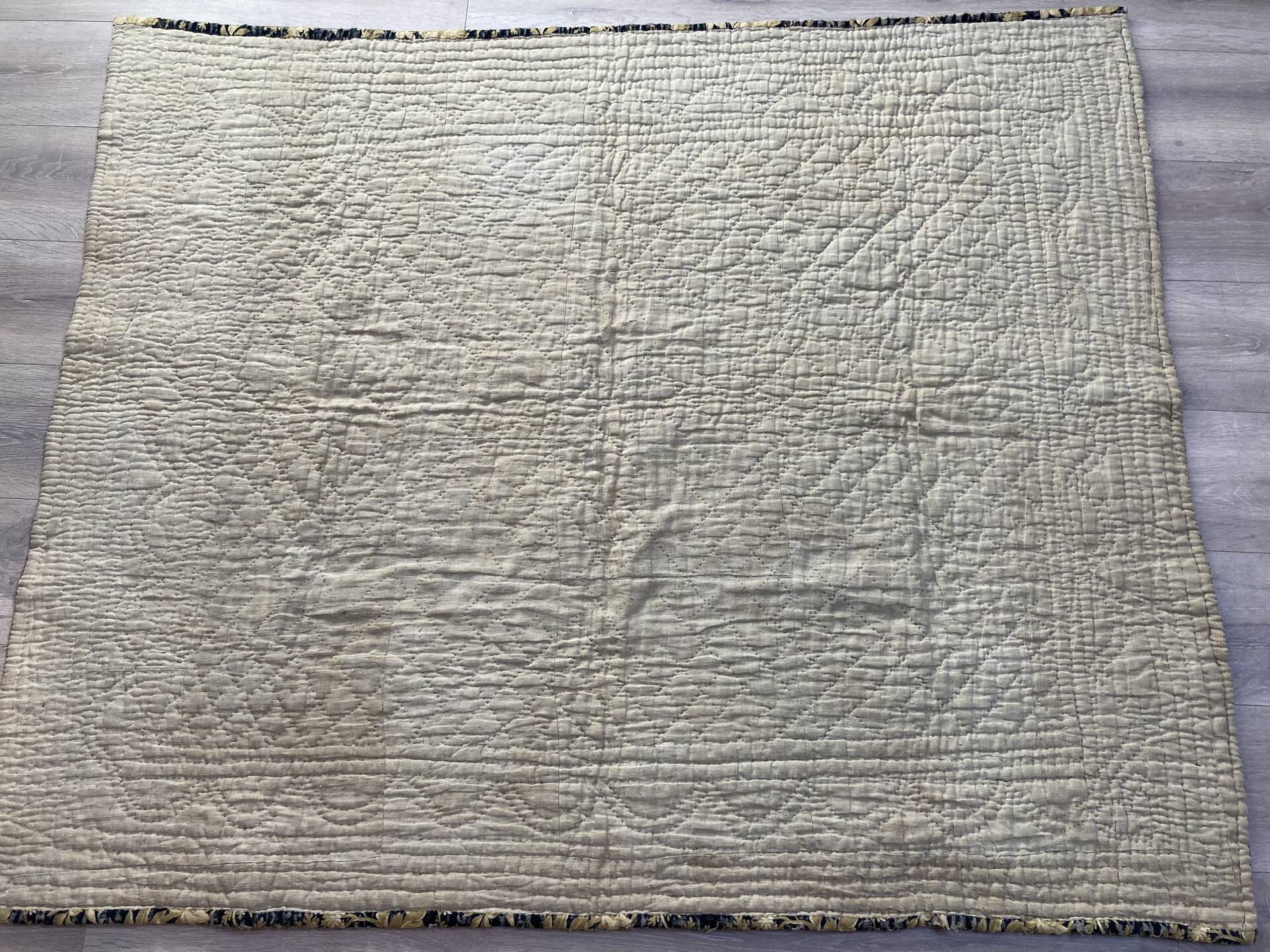 Antique hand-stitched boutis bedspread, floral fabric, 19th century.