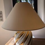 Pair of lamps of the brand Koska in white and twisted gold, with lampshade