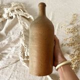 Old terracotta bottle