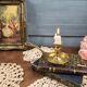 Vintage brass cellar rat, geometric handle in Art Deco style.