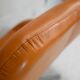 Sofa "space age". Leather, fiberglass, foam, steel. Circa 1970. Orange.