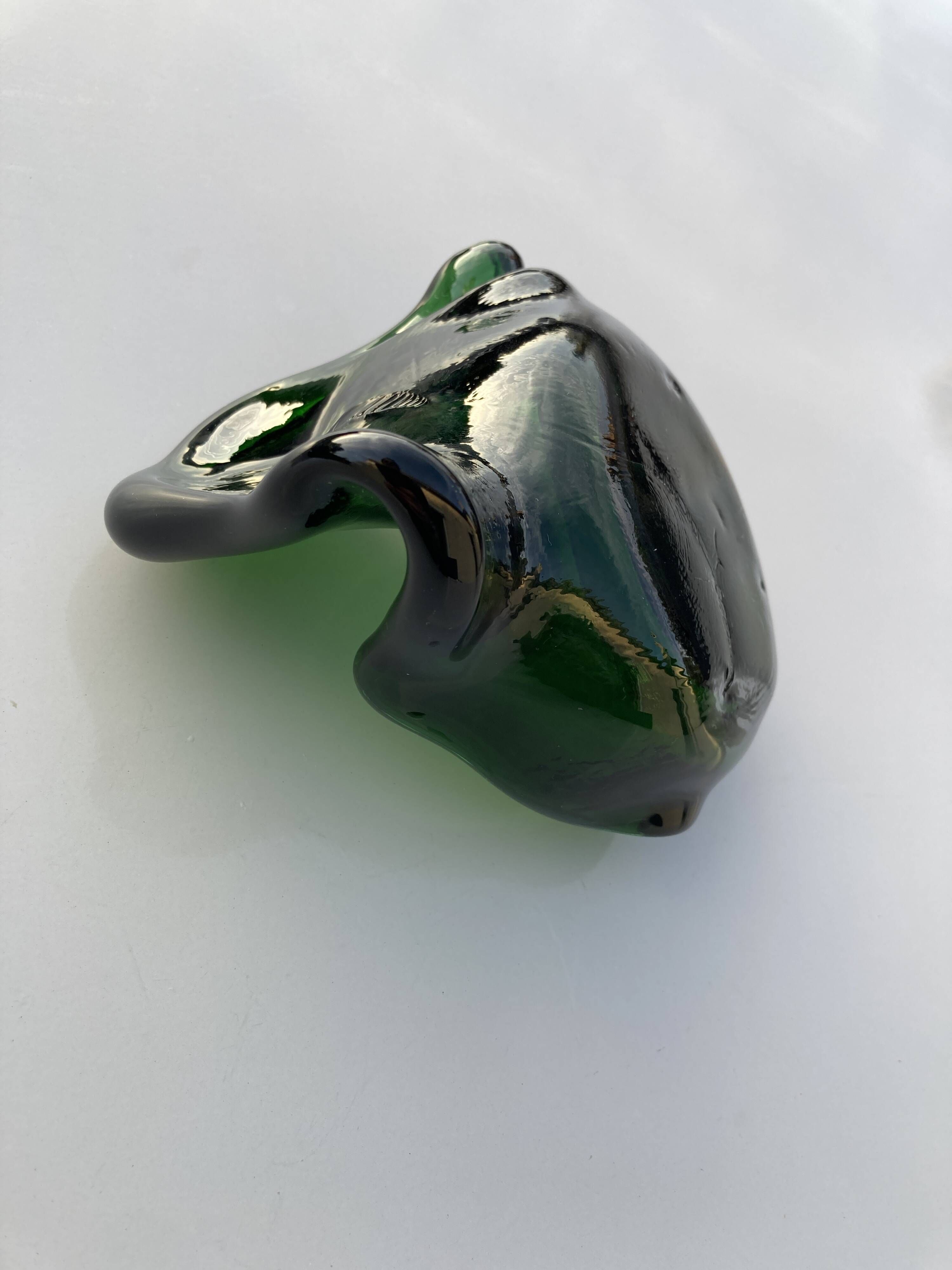 Sculptural ashtray in emerald green glass