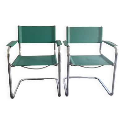 Paire de fauteuils en simili cuir et chrome