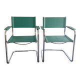 Paire de fauteuils en simili cuir et chrome