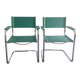 Pair of faux leather and chrome armchairs