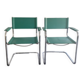 Pair of faux leather and chrome armchairs