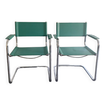 Pair of faux leather and chrome armchairs