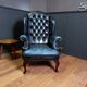 Blue chesterfield barrel back armchair