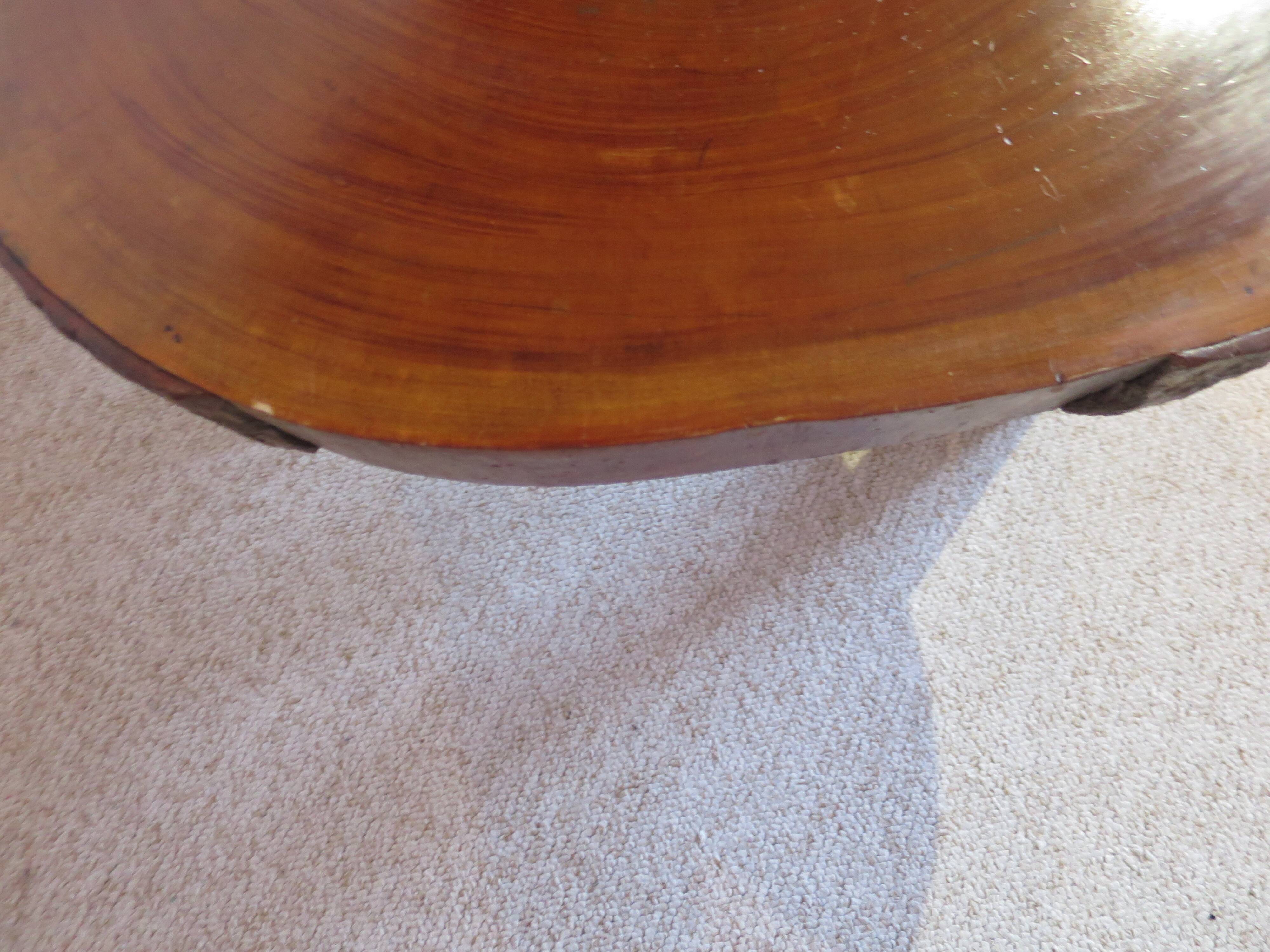 Tripod coffee table - solid okoumé wood - organic shape - brutalist style