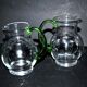 Set of 2 small blown glass wine pitchers - vintage green Alsatian balloon pitcher