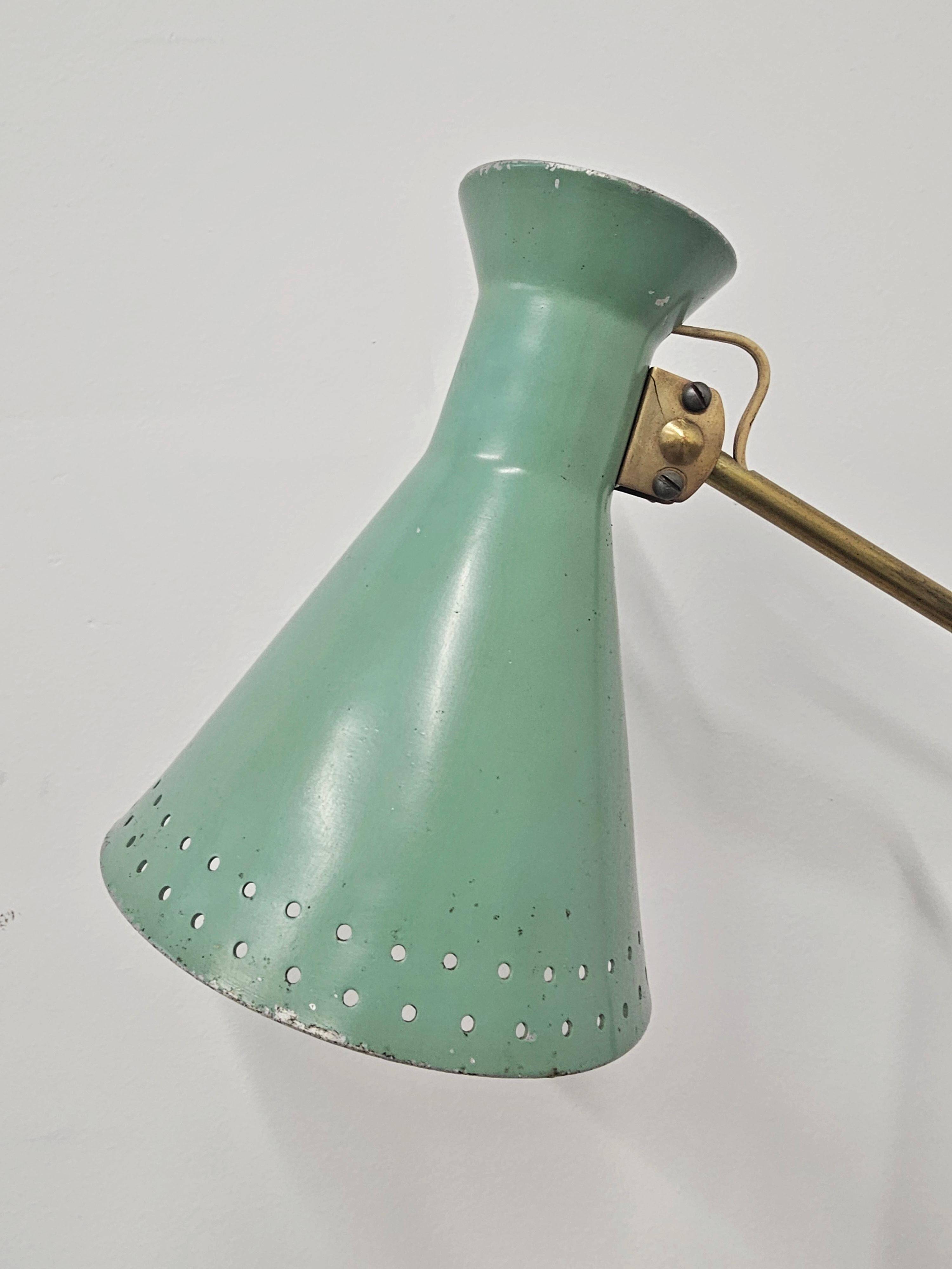 Mid-Century table lamp with a conical metal shade, attributed to Stilnovo.
