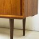 Danish teak sideboard with two sliding doors and 4 central drawers