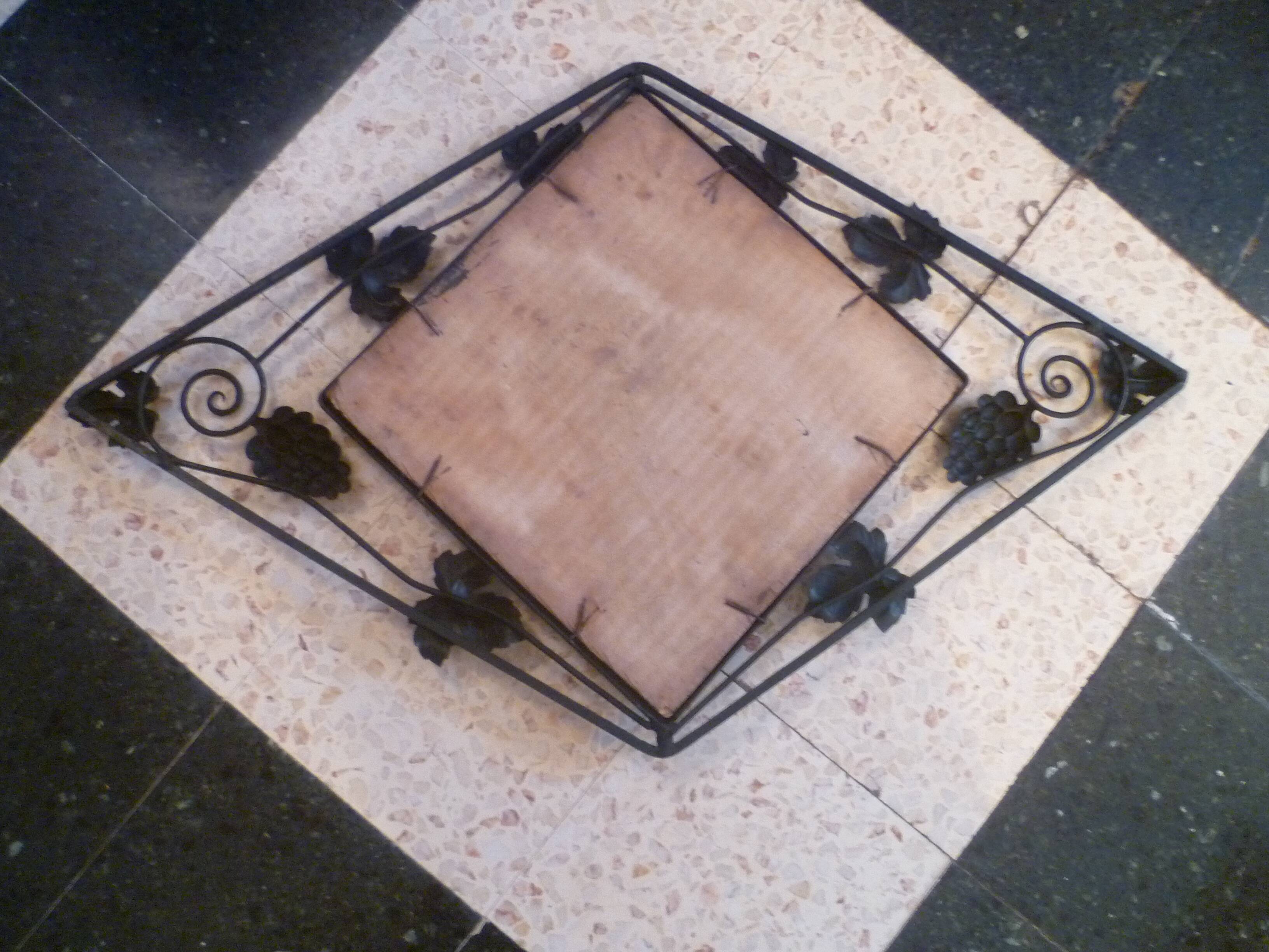 Art deco beveled mirror in wrought iron with grape decor