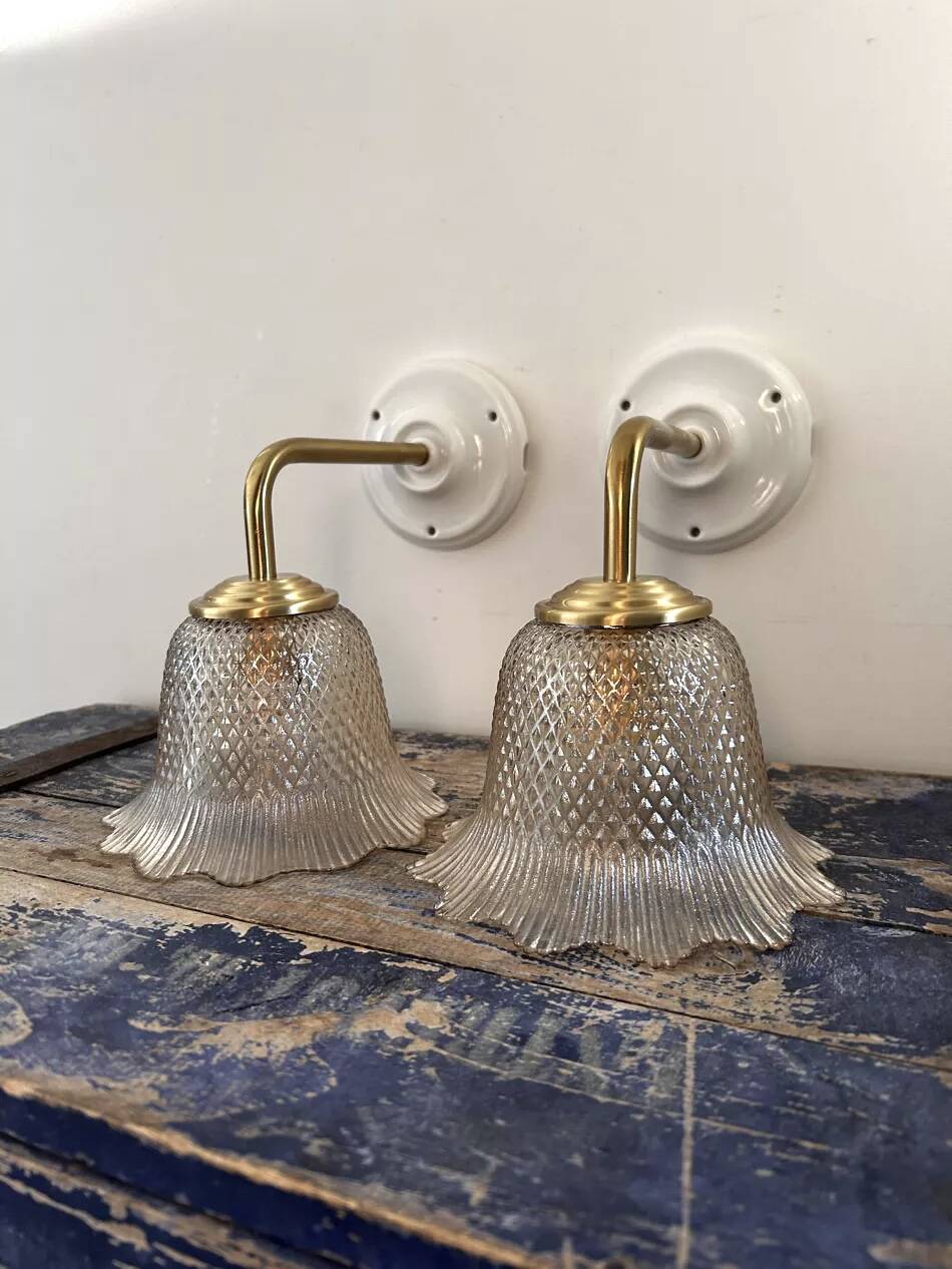 Pair of gold wall sconces