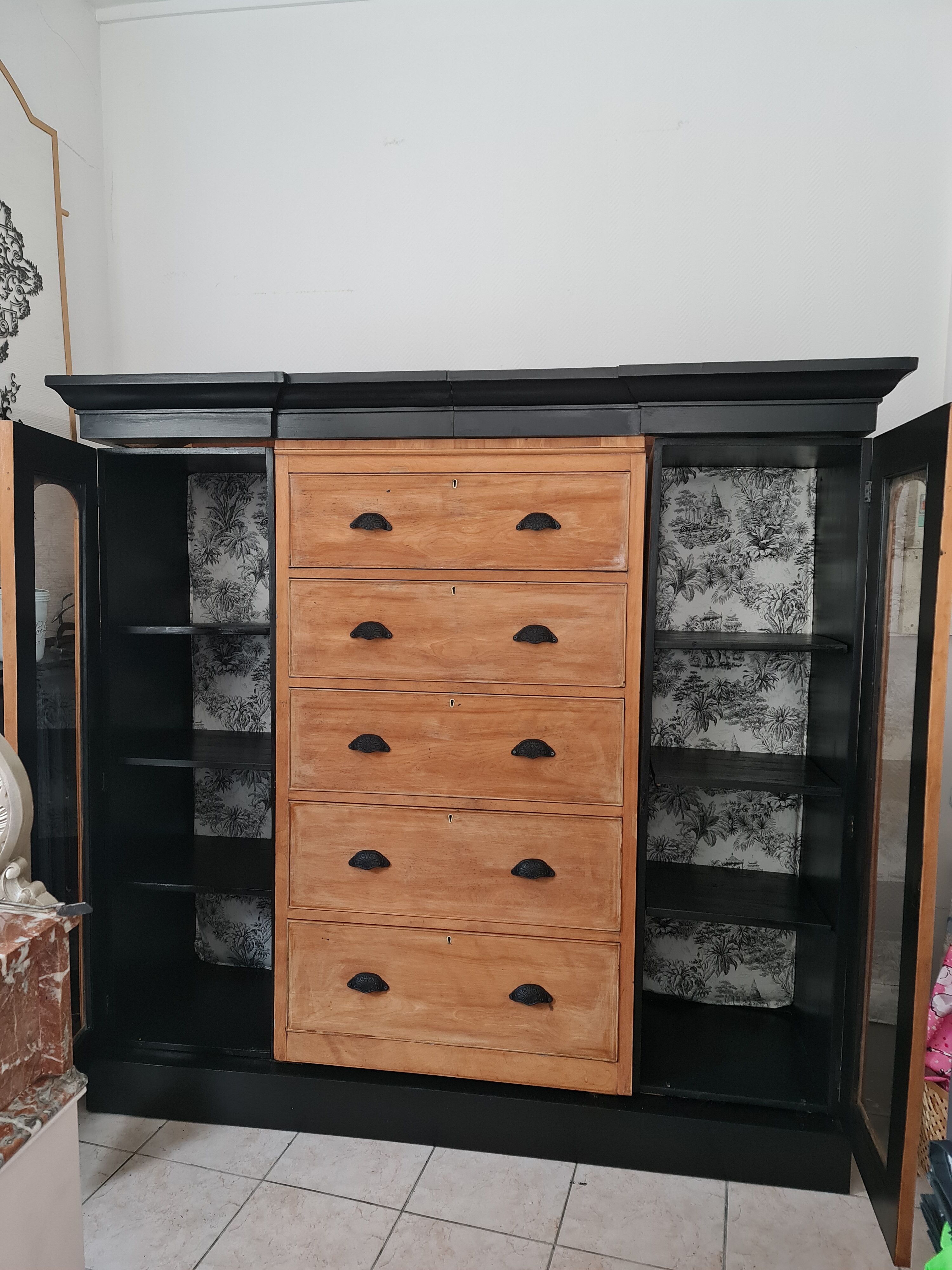 Furniture oftier in raw and black lemon tree and background dresses in cotton wool and black jungle print fabrics