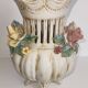 Antique ceramic pot-pourri vase with relief floral decoration.