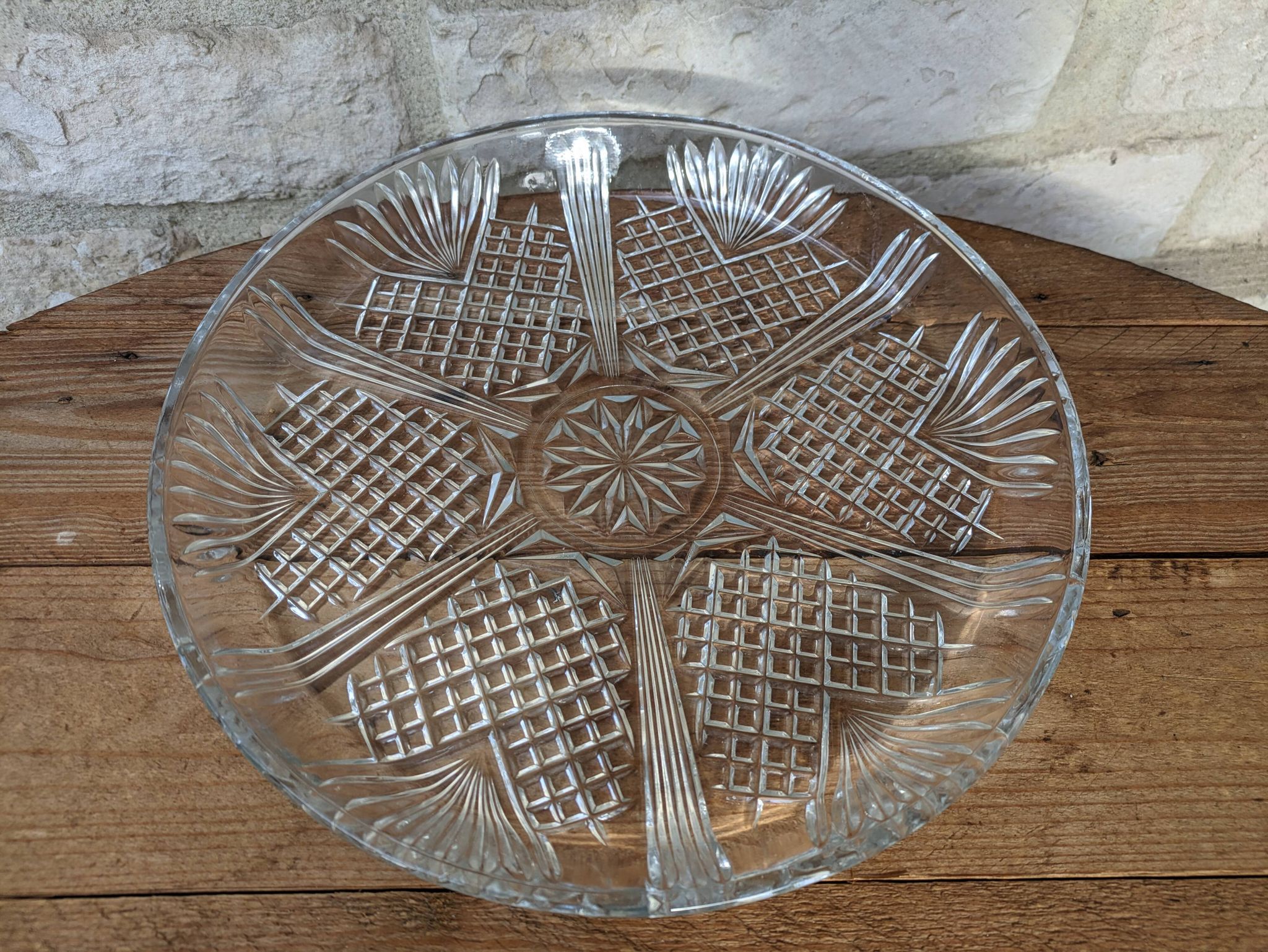 Relief molded glass plate serving dish with rim