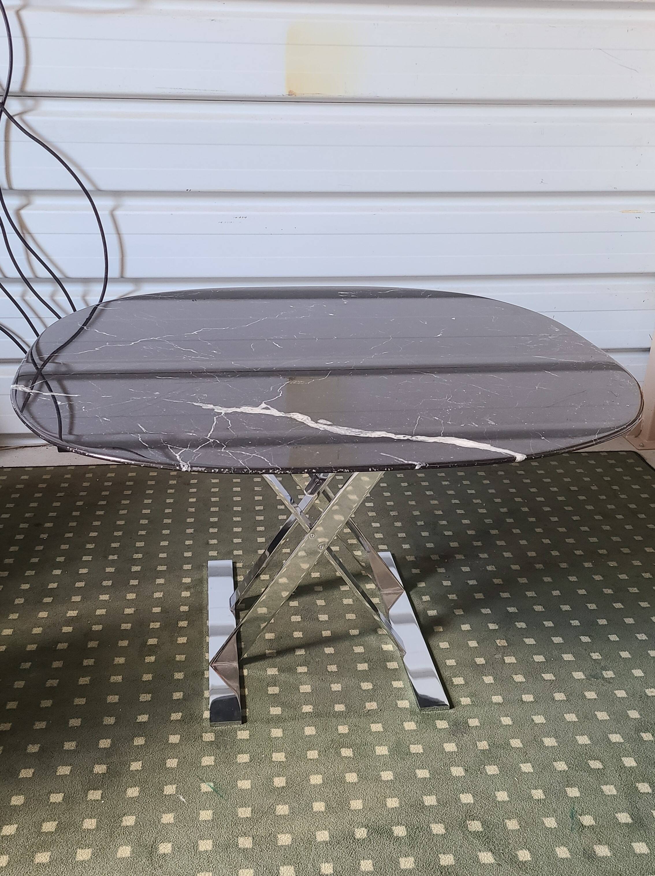 Table model Pathos collection Simplice edited by Maxalto of the B&B Italia group.