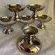 Set of 6 stainless steel ice cream bowls by Guy Degrenne with matching spoons.