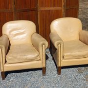 Pair of 1930s club armchairs in ivory leather.