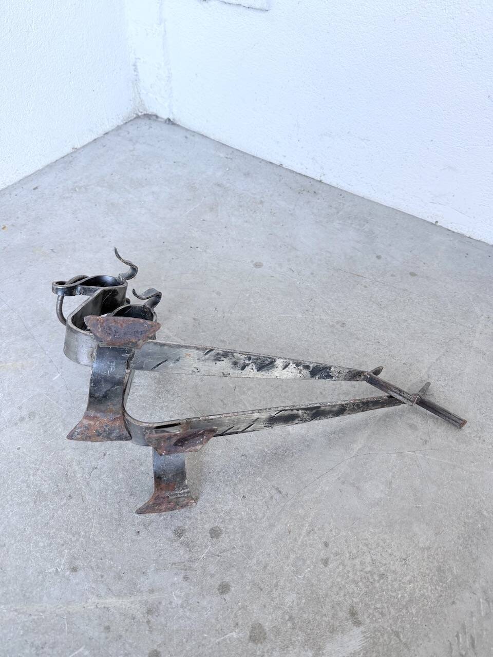 Pair of zoomorphic metal andirons "dogs" 1950