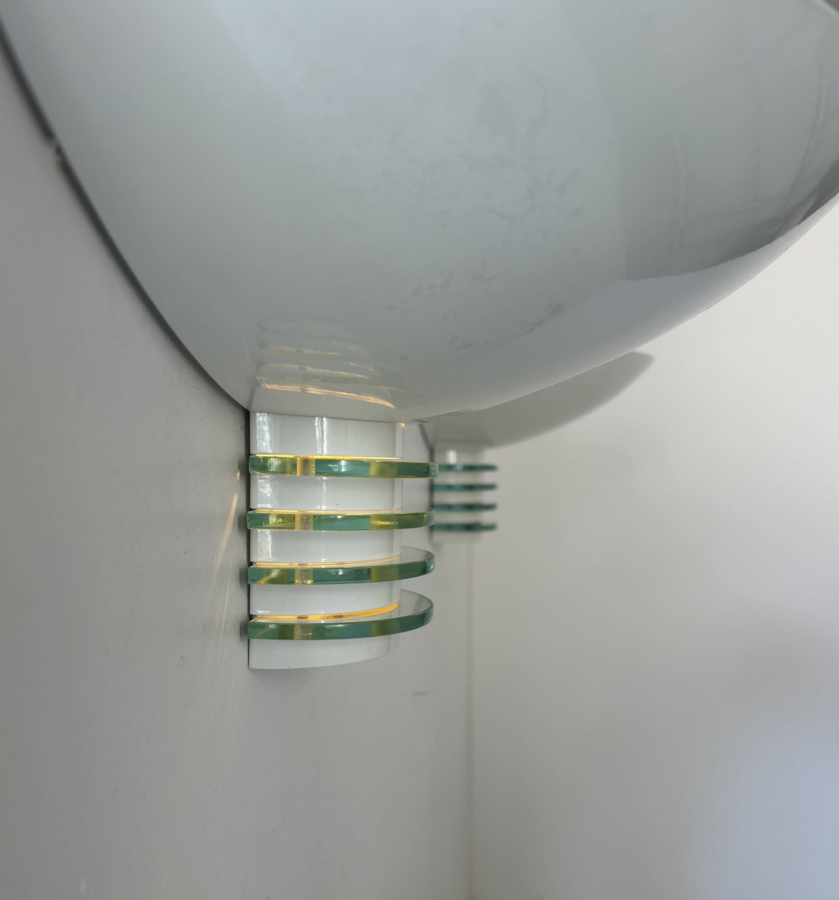 Pair of post-modernist wall lights, white metal and glass, France 1980