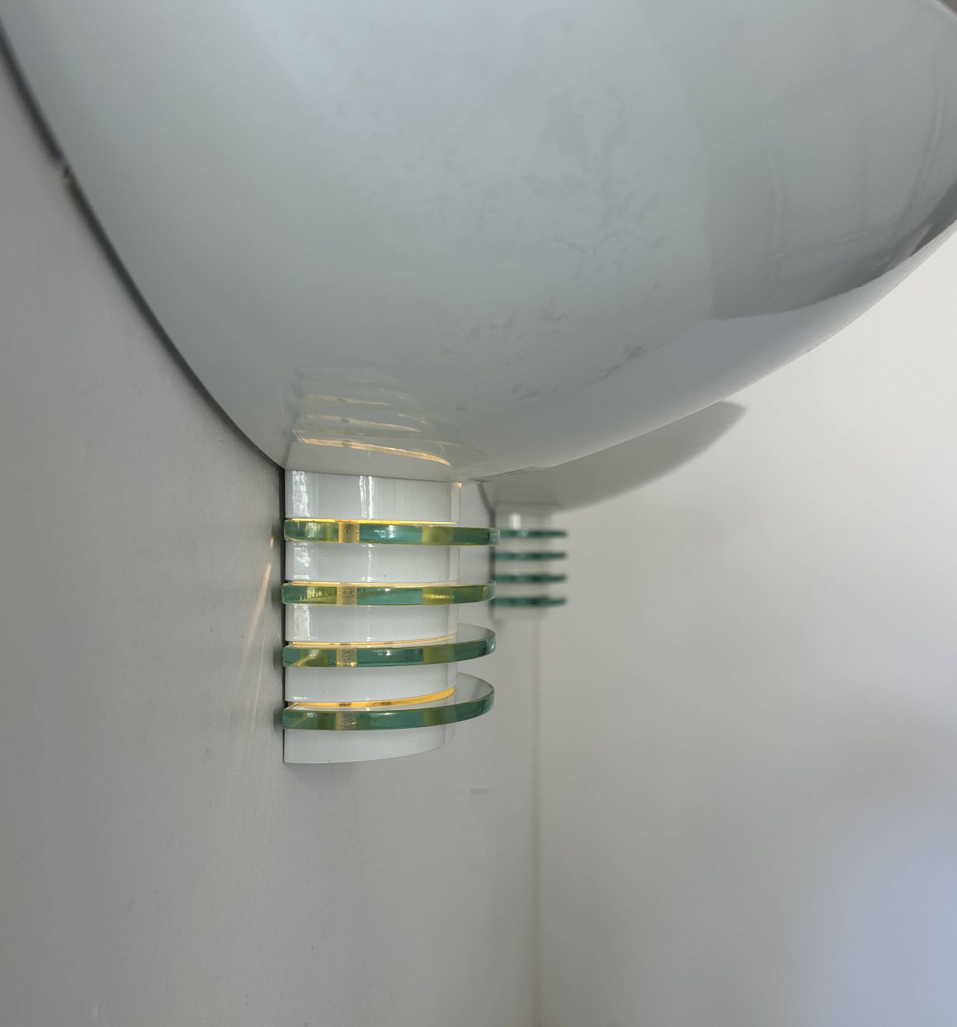 Pair of post-modernist wall lights, white metal and glass, France 1980