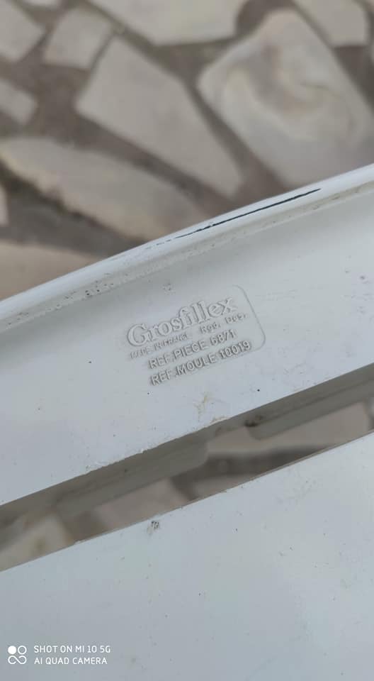 Four Grosfillex armchairs