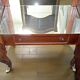 A Louis XV style display cabinet with three beechwood shelves and a white marble top.