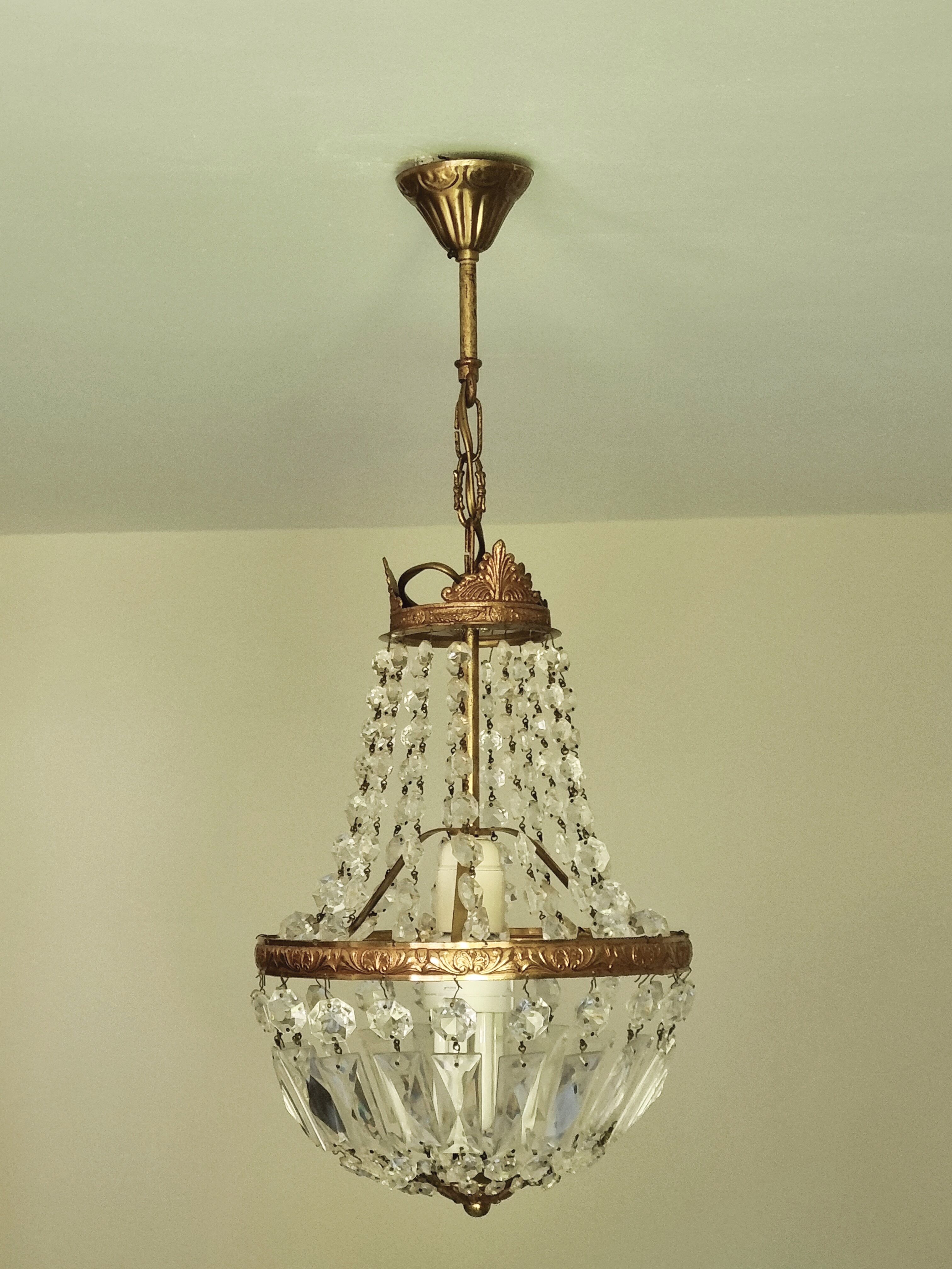 Brass chandelier and grapevine glass