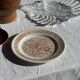 Set of 6 vintage dessert plates made in Poland with a plant motif.