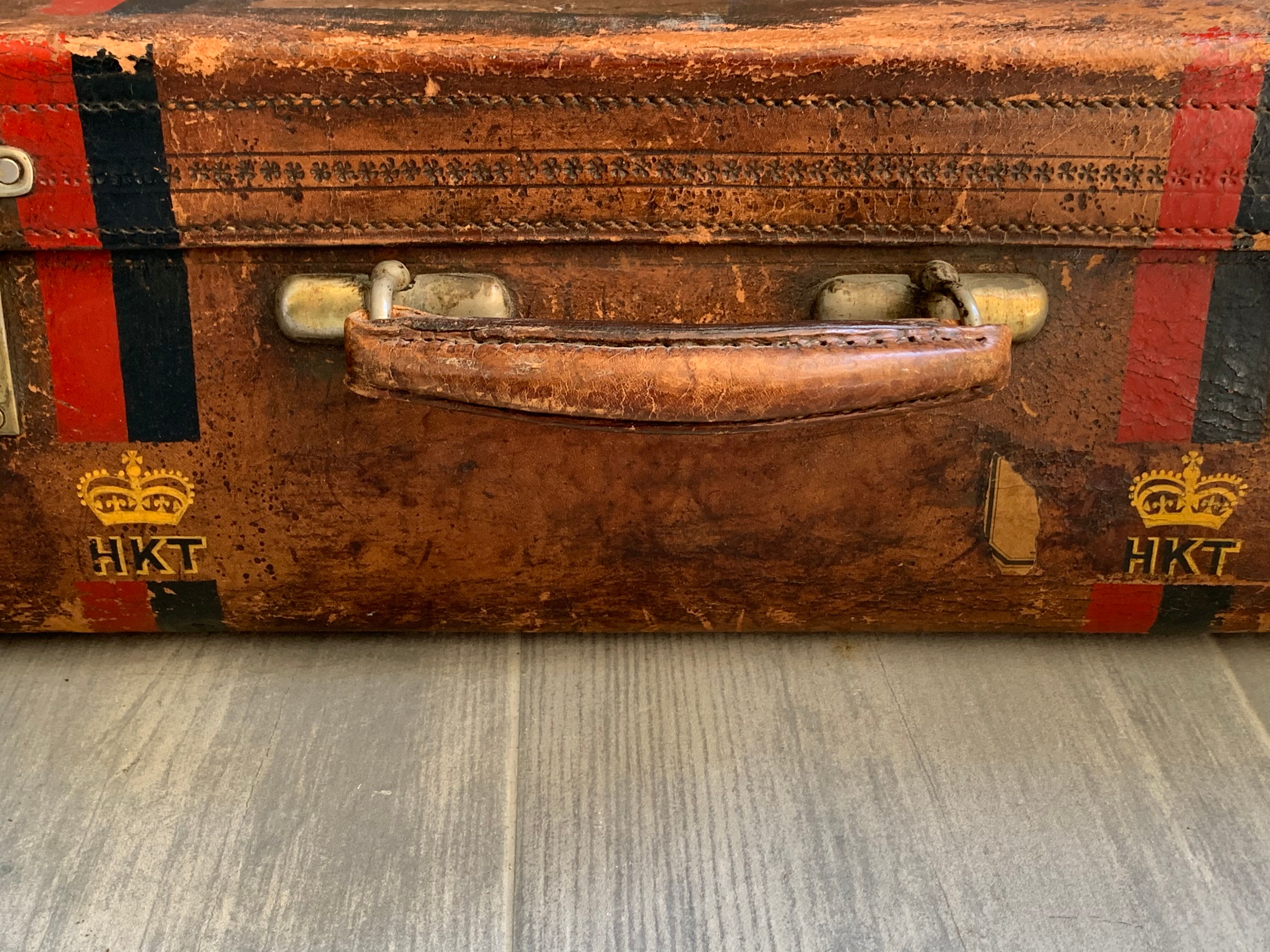 Rare old English suitcase stamped with the royal crown