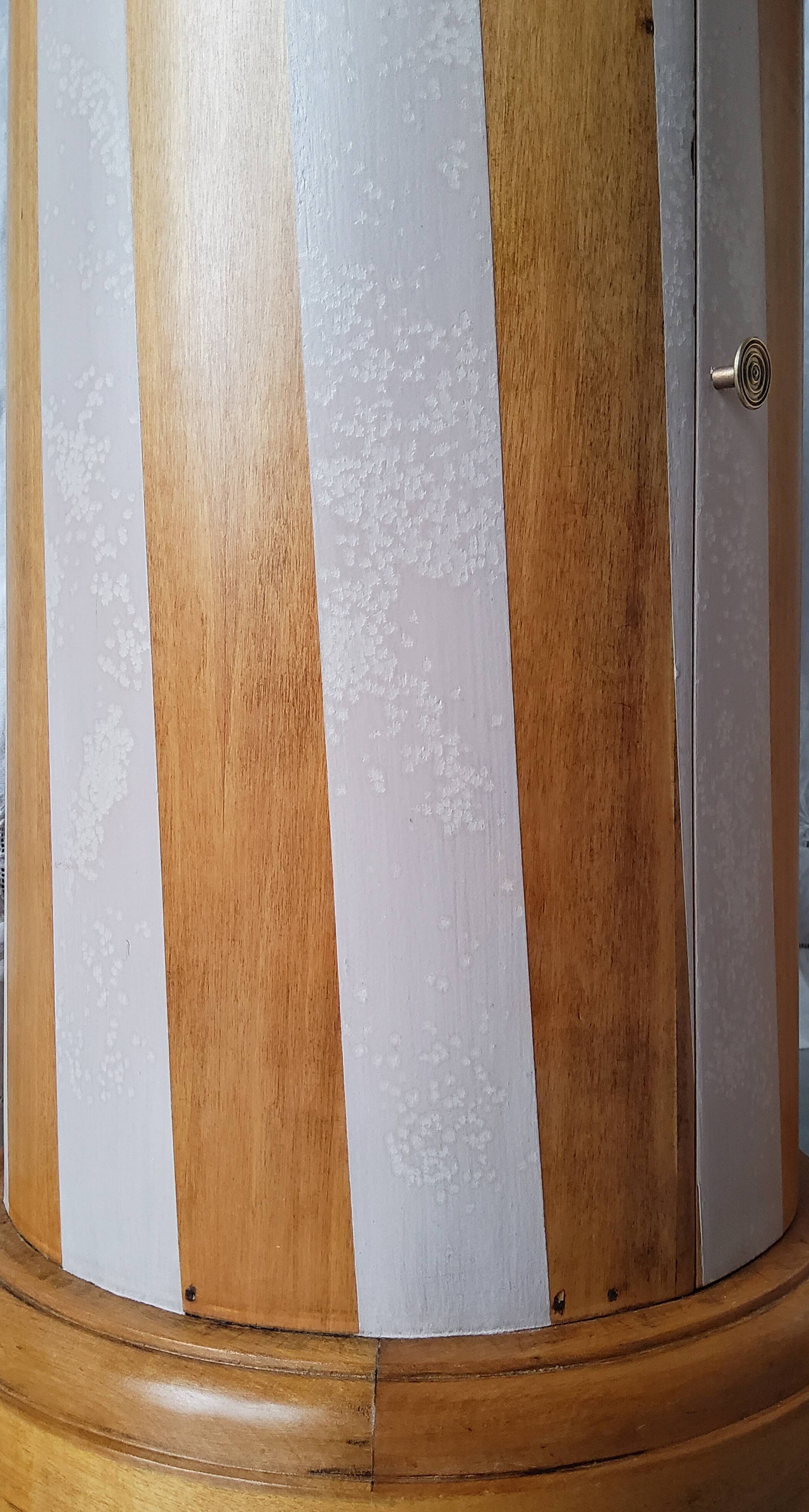 A pair of distressed bedside tables.