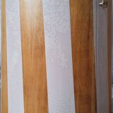 A pair of distressed bedside tables.