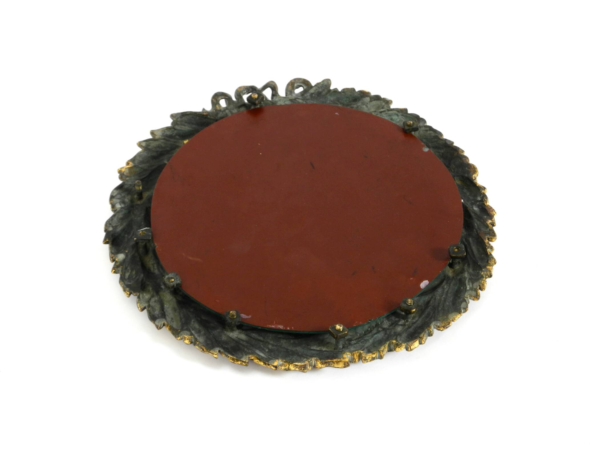 Beautiful small French mid-century wall mirror with an ornate brass frame