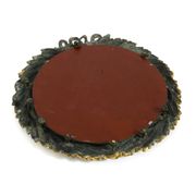 Beautiful small French mid-century wall mirror with an ornate brass frame