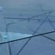 Tempered glass coffee table, intertwined legs design