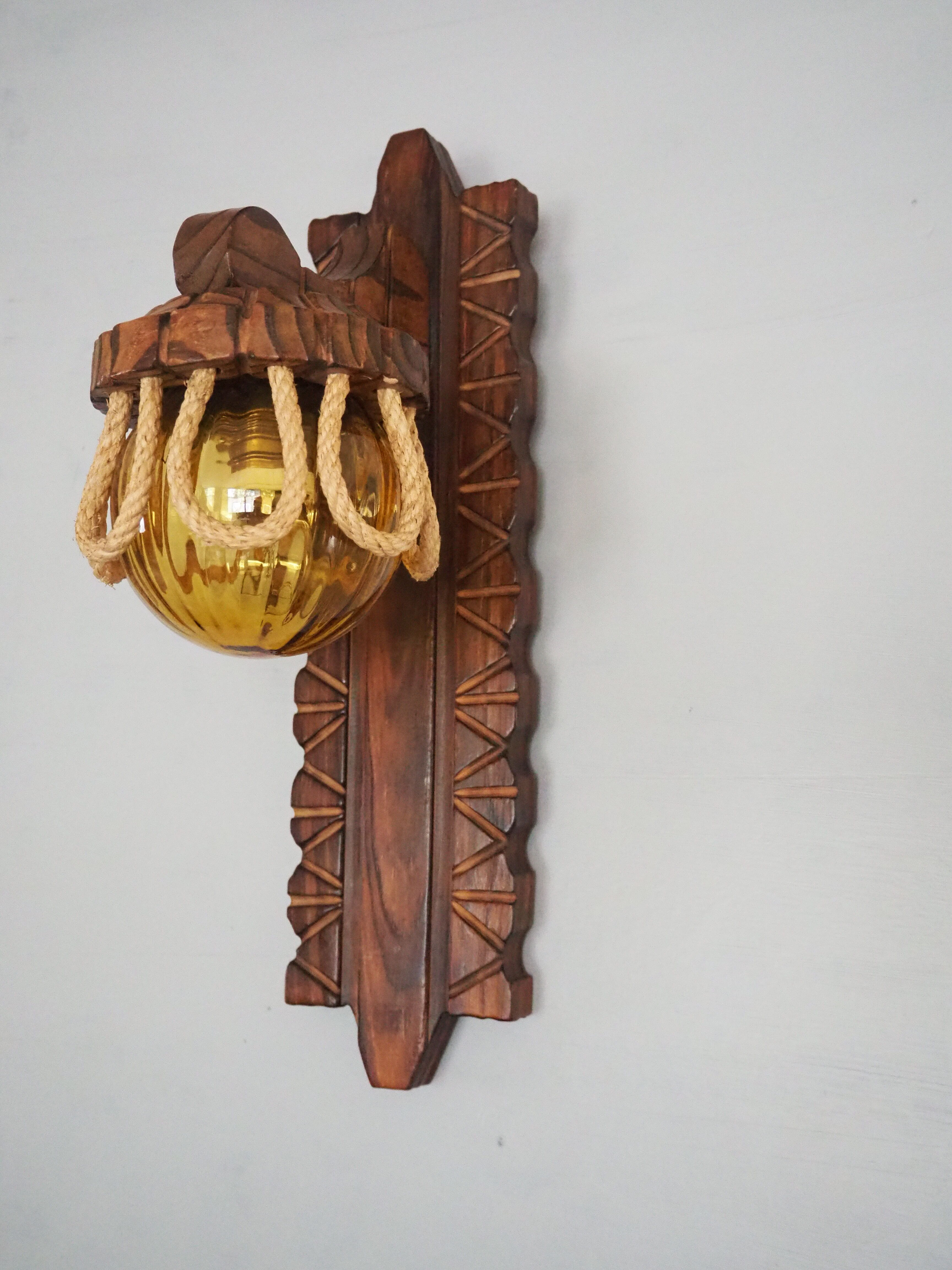 Sconce in wood and yellow glass ball from the 1960/1970