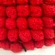 Vintage cushion red pompoms