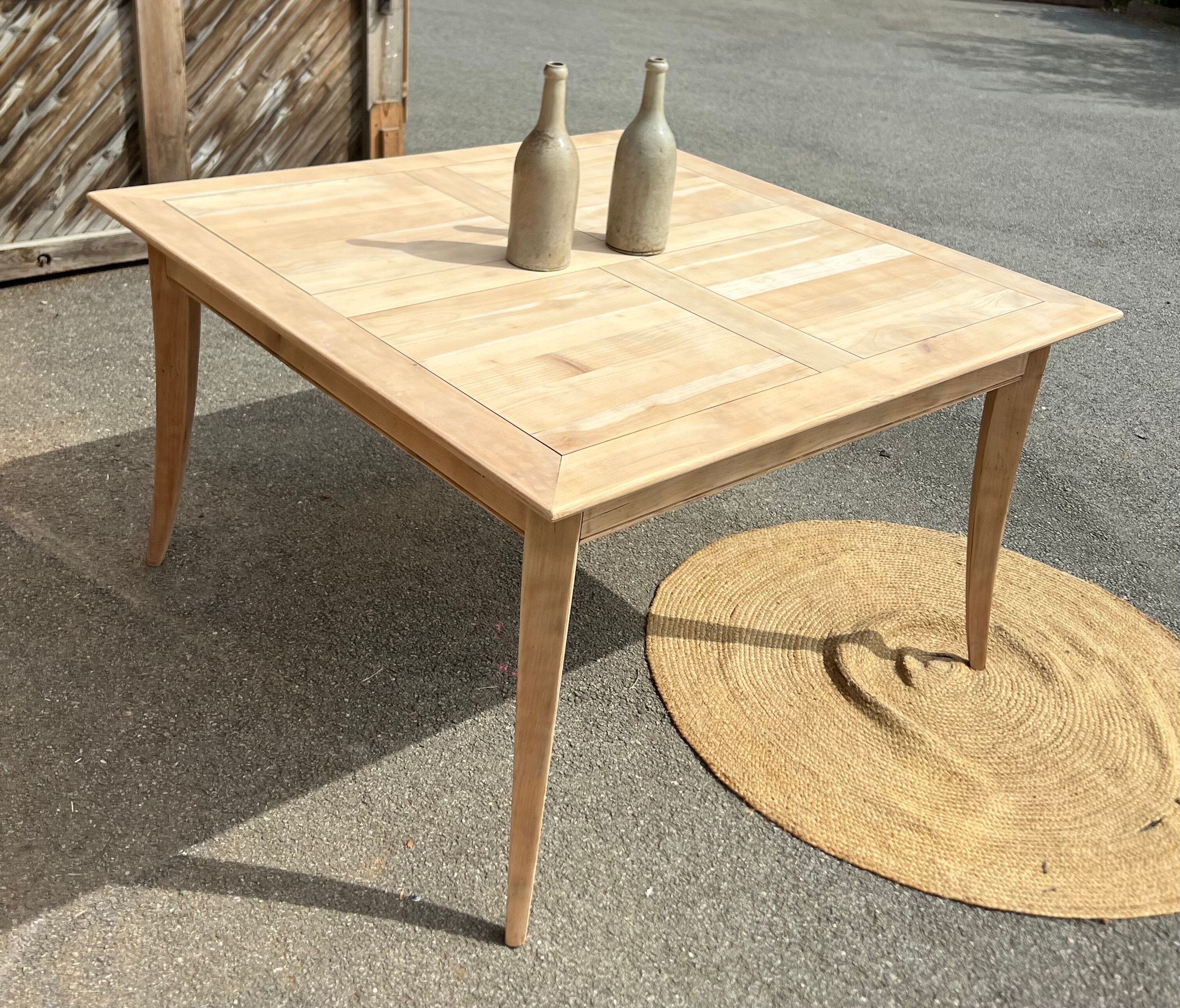 Large renovated square family table with 2 extensions in raw solid wood.