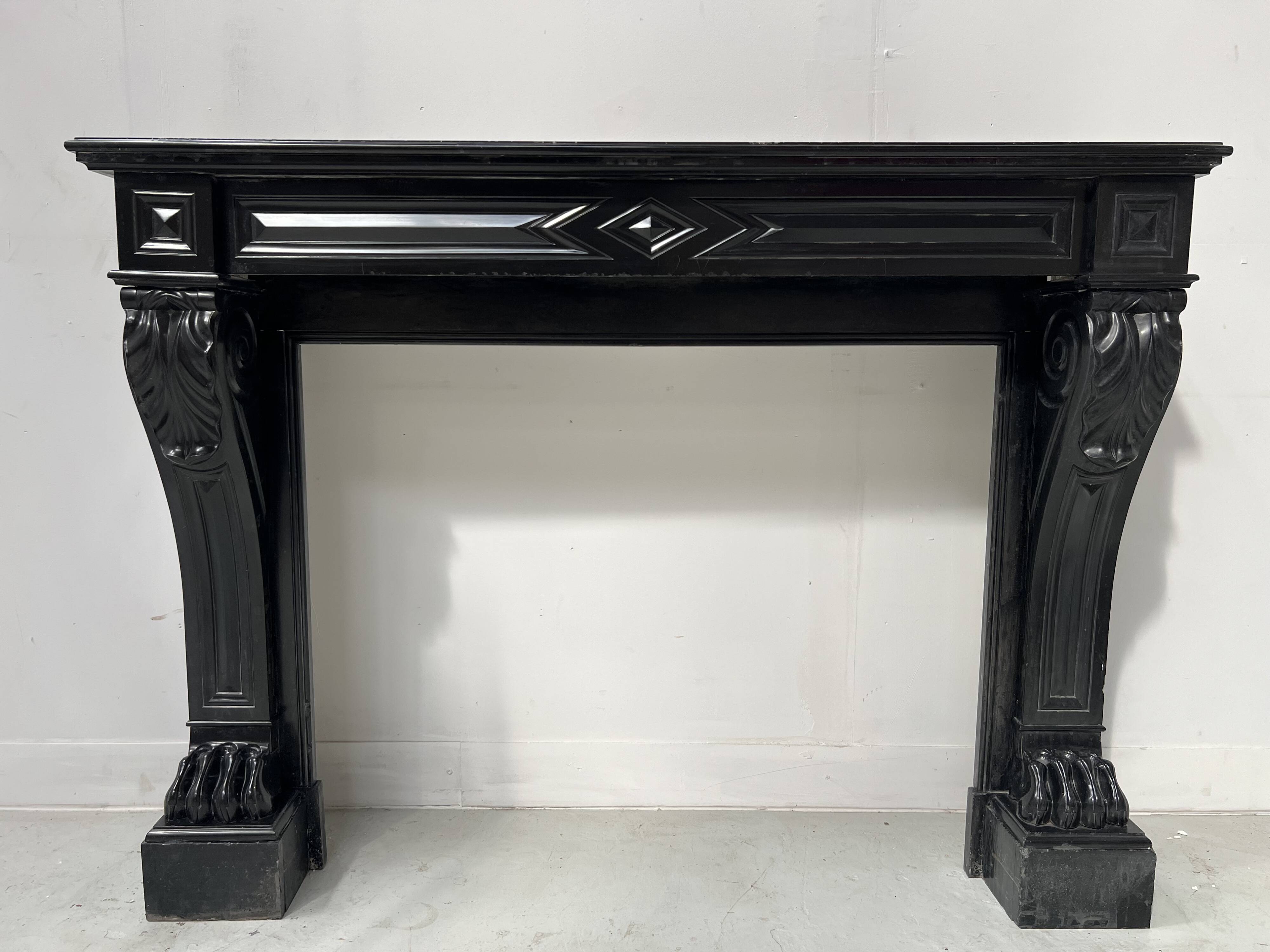 Napoleon III fireplace with claw feet in black marble, 19th century