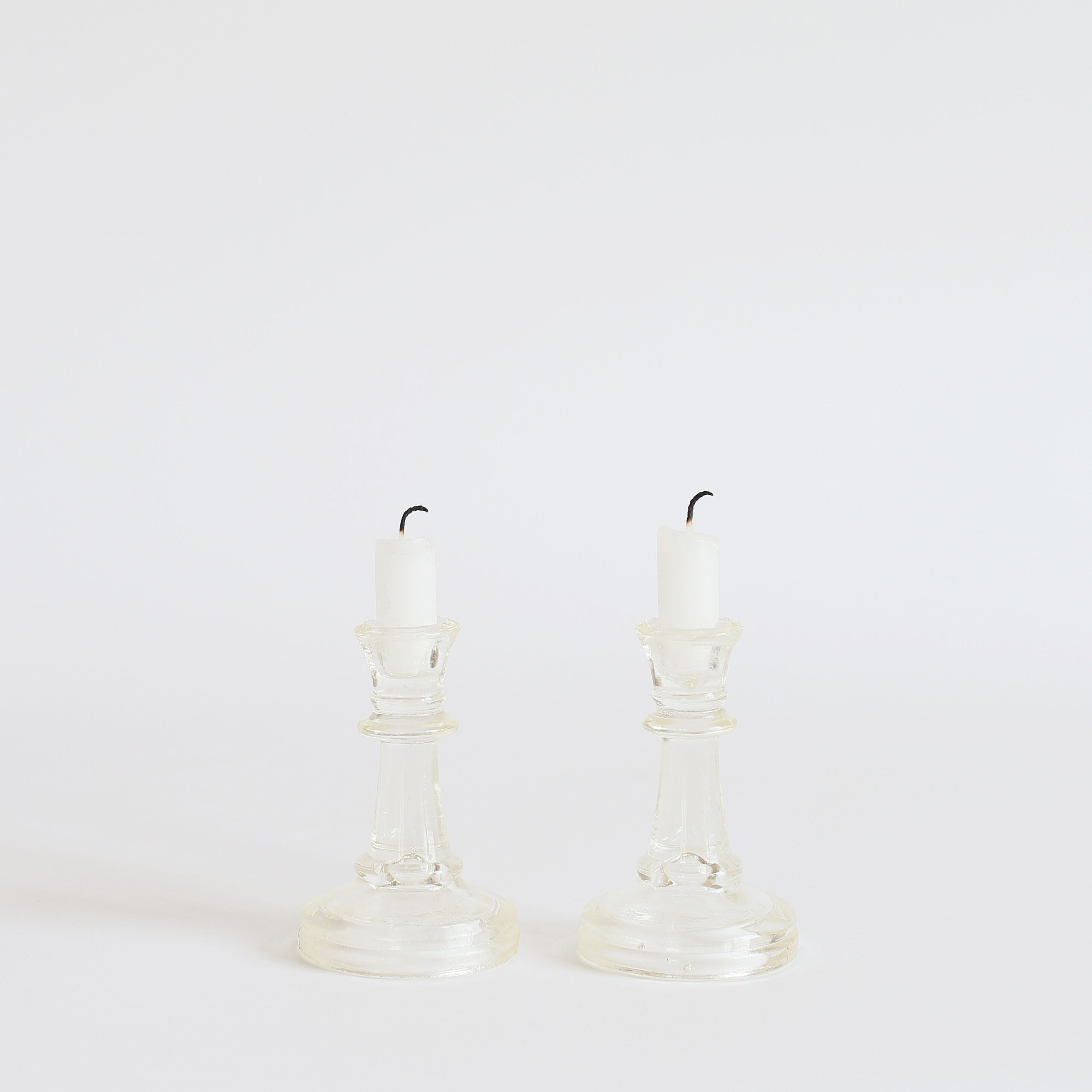 Pair of glass candle holders