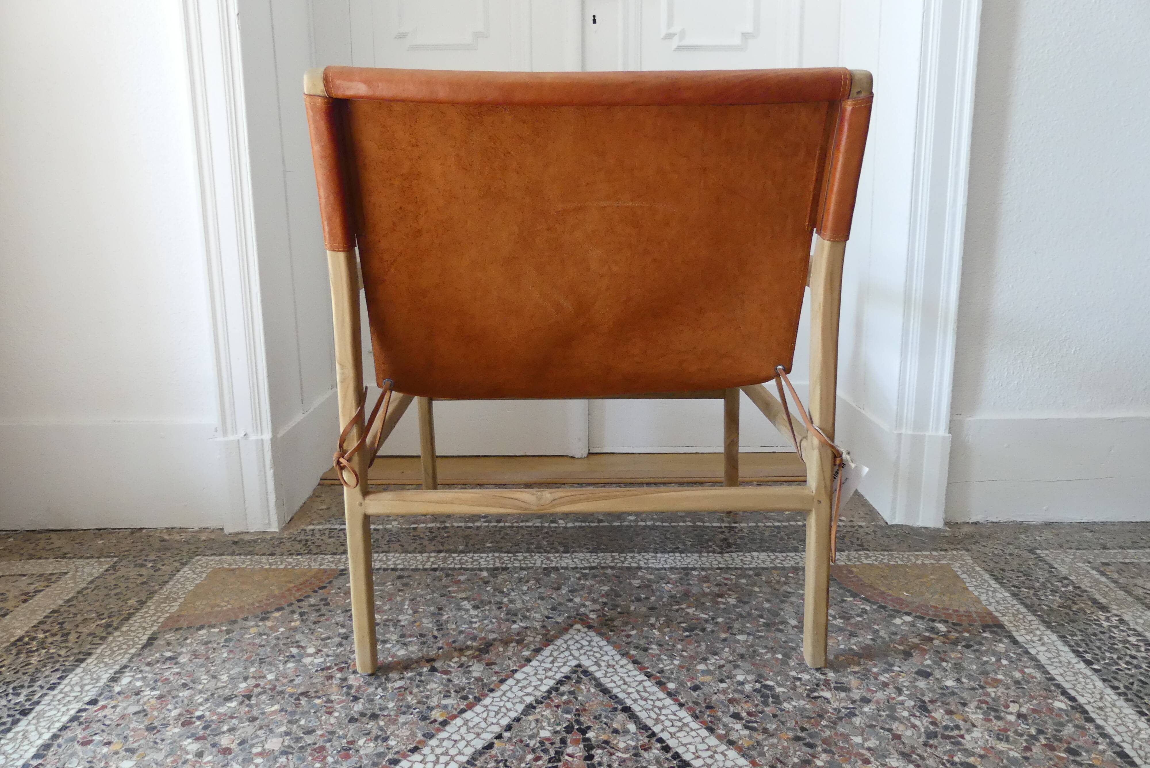 Havana armchair in teak and cowhide leather