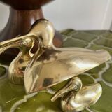 Three brass ducks from the 1950s
