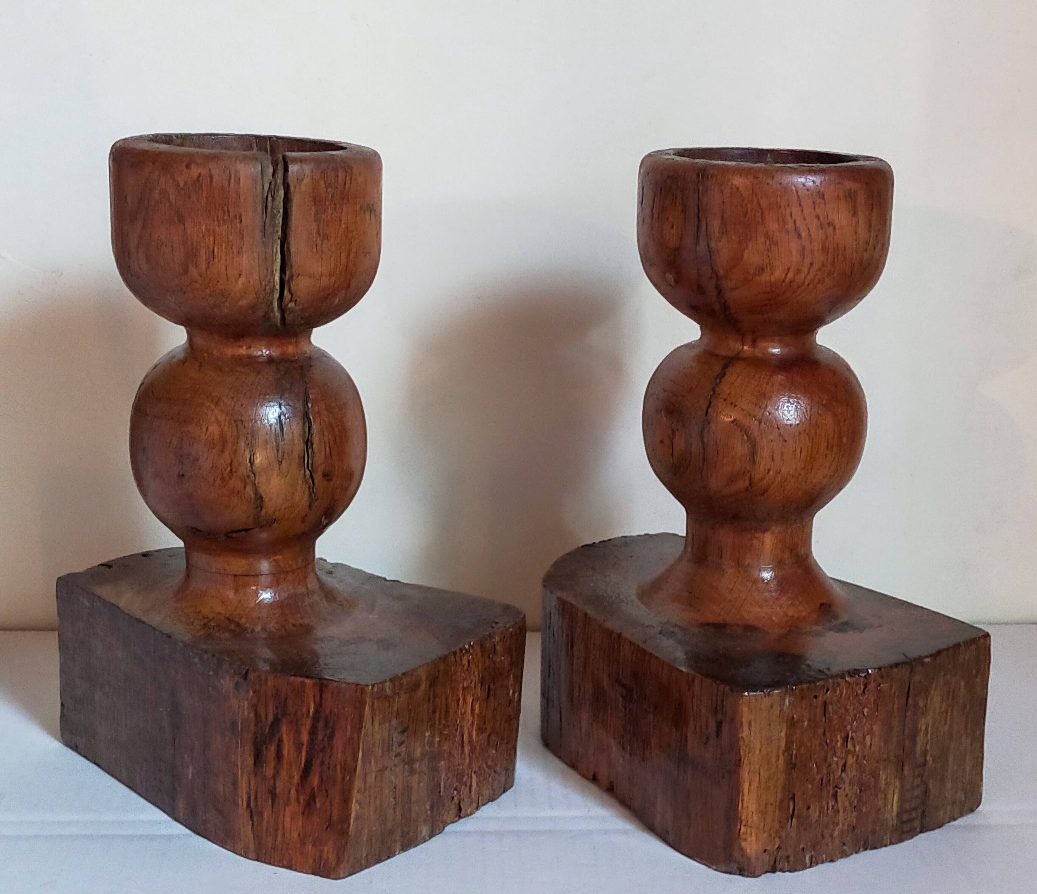 Pair of old brutalist turned solid wood candlesticks