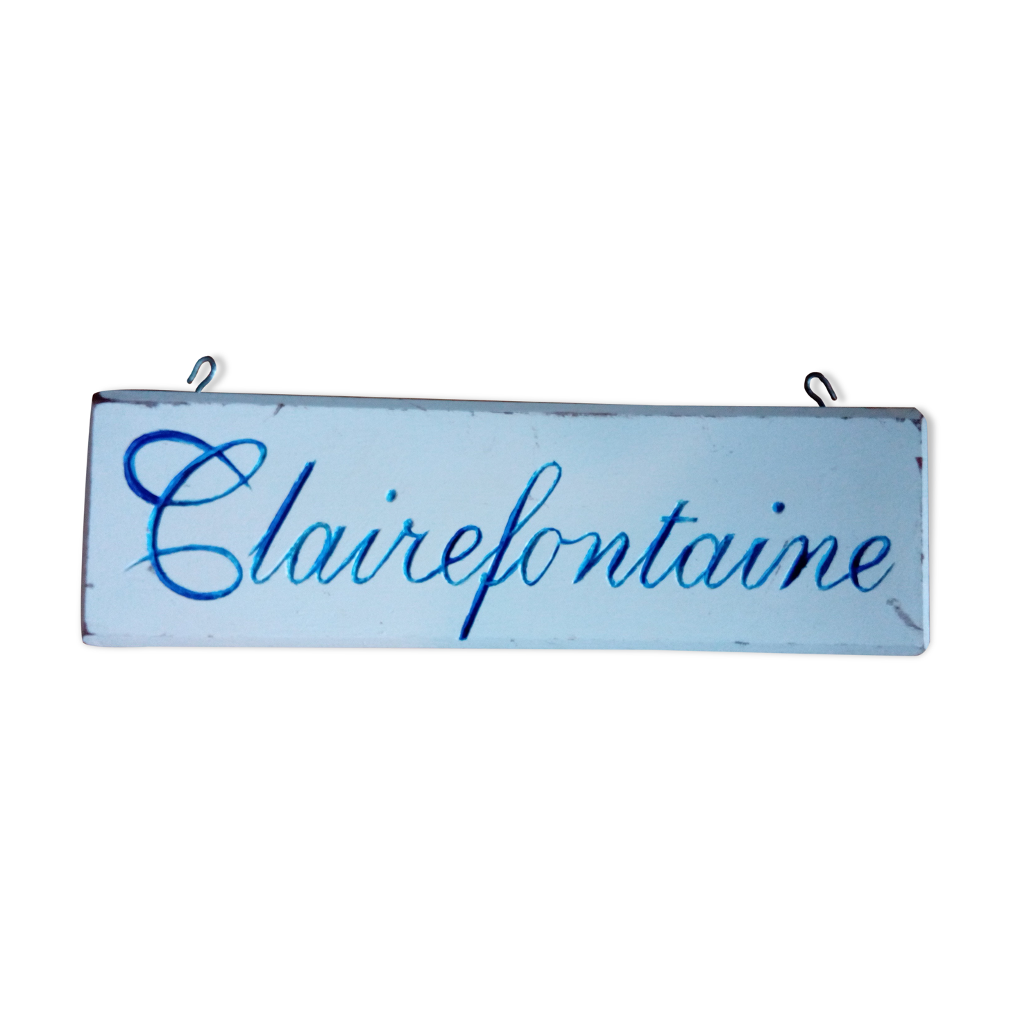 Panneau en bois double face avec inscription sculptée "clairefontaine"